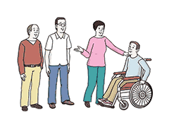 Zwei Männer und eine Frau stehen bei einem Mann im Rollstuhl und reden mit ihm