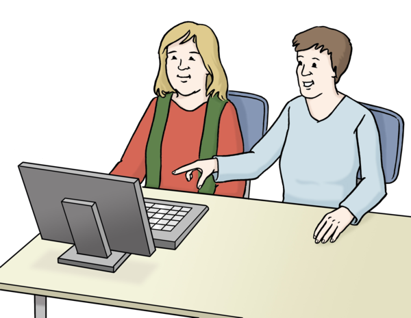 Zwei Frauen sitzen vor einem Computer. Eine Frau zeigt mit ihrer Hand auf den Bildschirm.