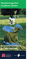 Das Titelbild des Flyers ber die Kunstwerke im Skulpturengarten im Auenbereich des Schafhofs - Europisches Knstlerhaus Oberbayern zeigt die Skluptur "SpaceSheep" des ungarischen Knstlers Csongor Szigeti, ein silbernes, halb abstraktes Schaf auf einer Wiese.